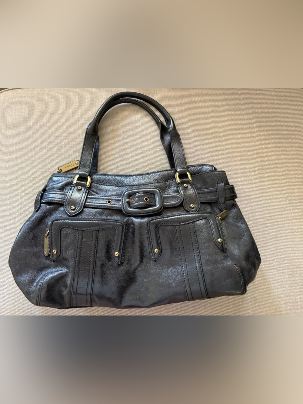 Large Cole Haan black leather satchel bag gold hardware buckle detail zipper top